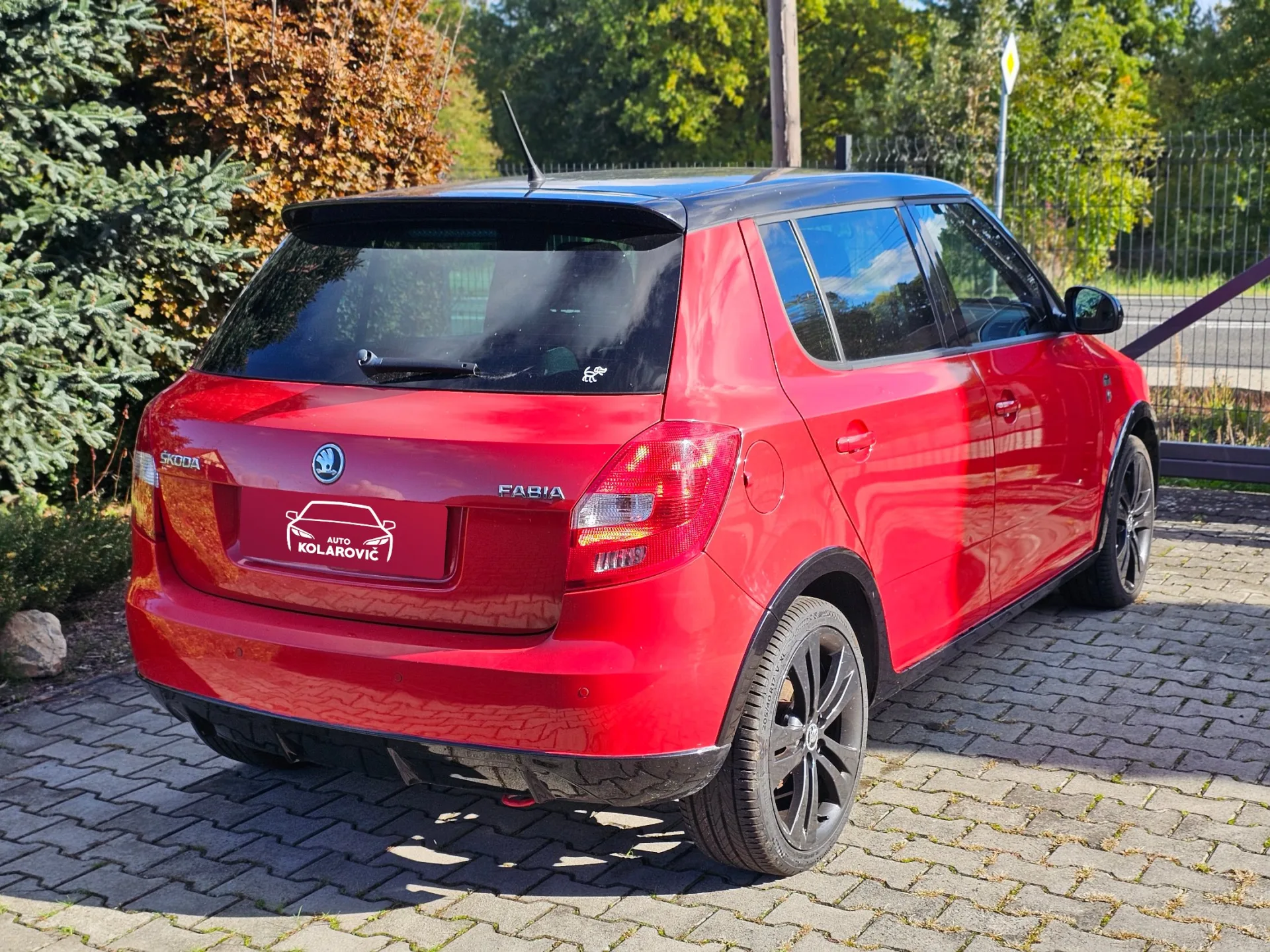 Škoda Fabia II 1.2 TSi Monte Carlo (2014, Červená) – fotografie vozidla 5 z 20