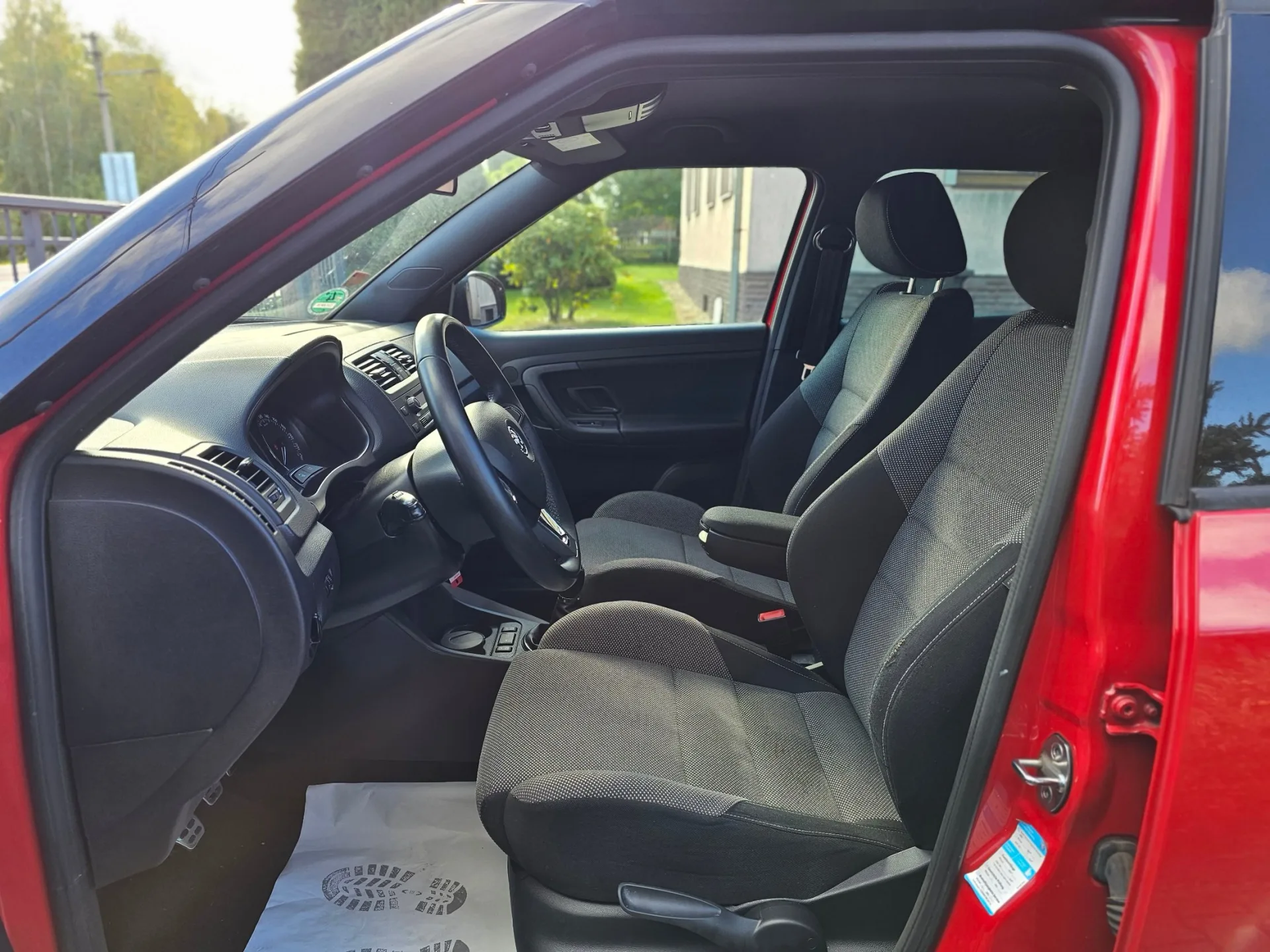 Škoda Fabia II 1.2 TSi Monte Carlo (2014, Červená) – fotografie vozidla 10 z 20