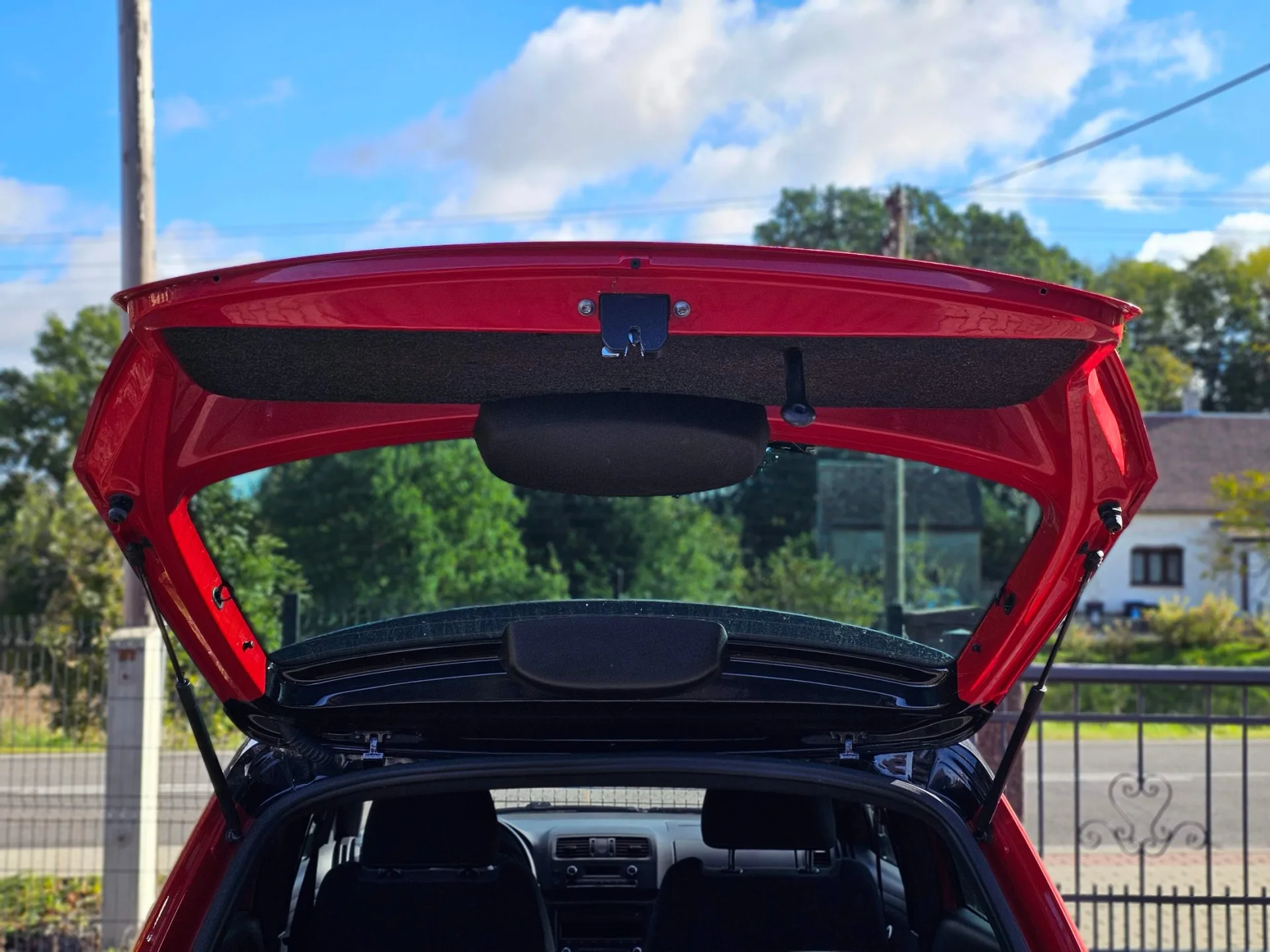 Škoda Fabia II 1.2 TSi Monte Carlo (2014, Červená) – fotografie vozidla 19 z 20
