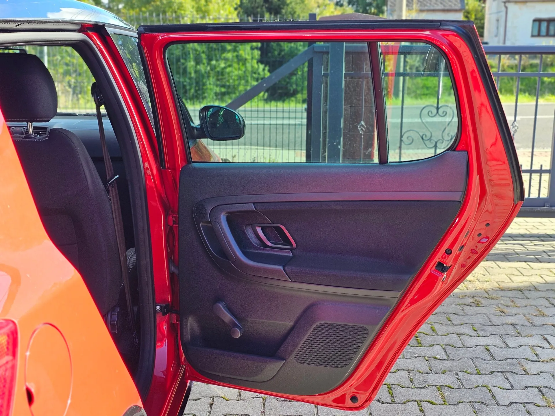 Škoda Fabia II 1.2 TSi Monte Carlo (2014, Červená) – fotografie vozidla 18 z 20