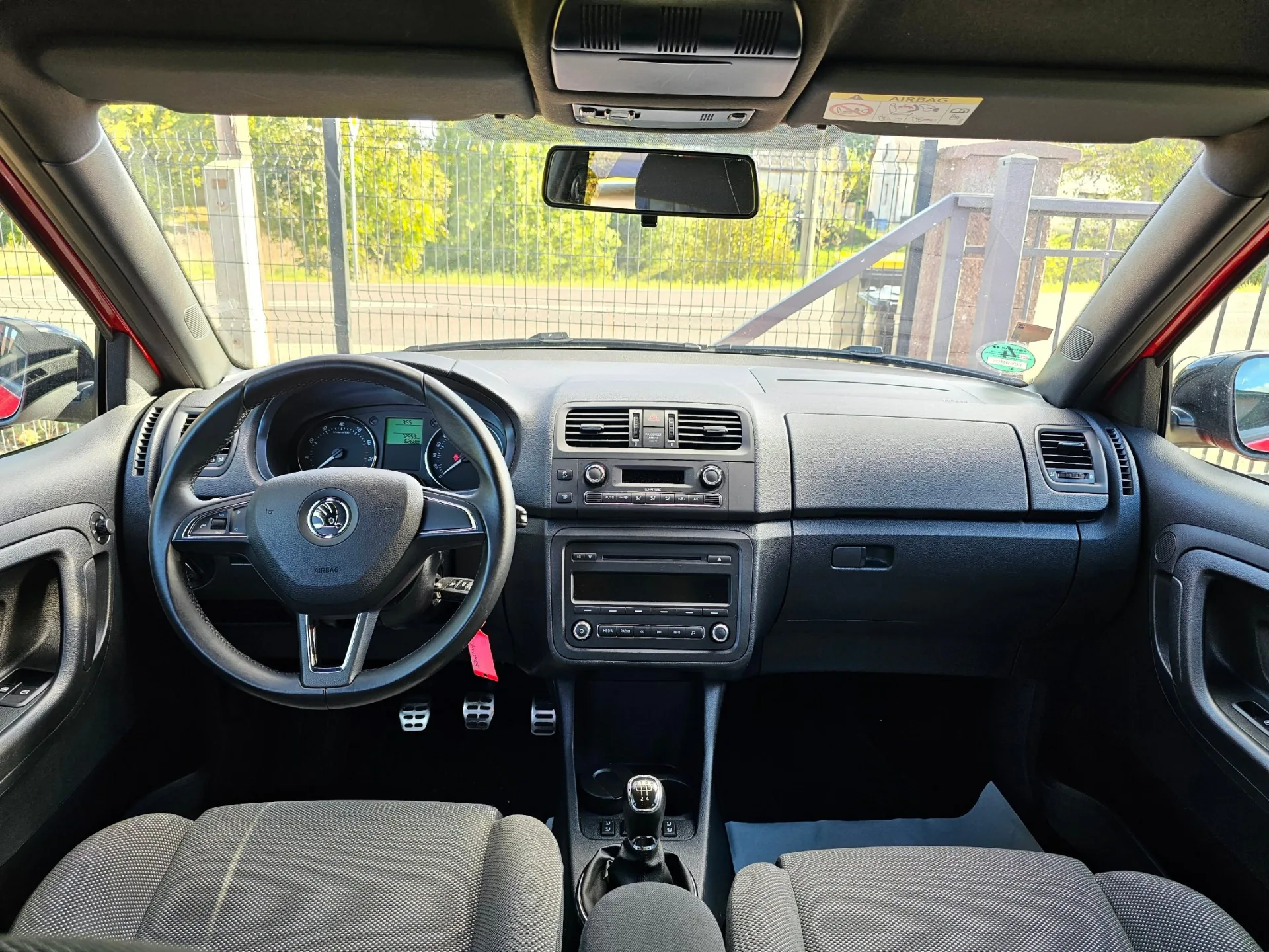 Škoda Fabia II 1.2 TSi Monte Carlo (2014, Červená) – fotografie vozidla 12 z 20