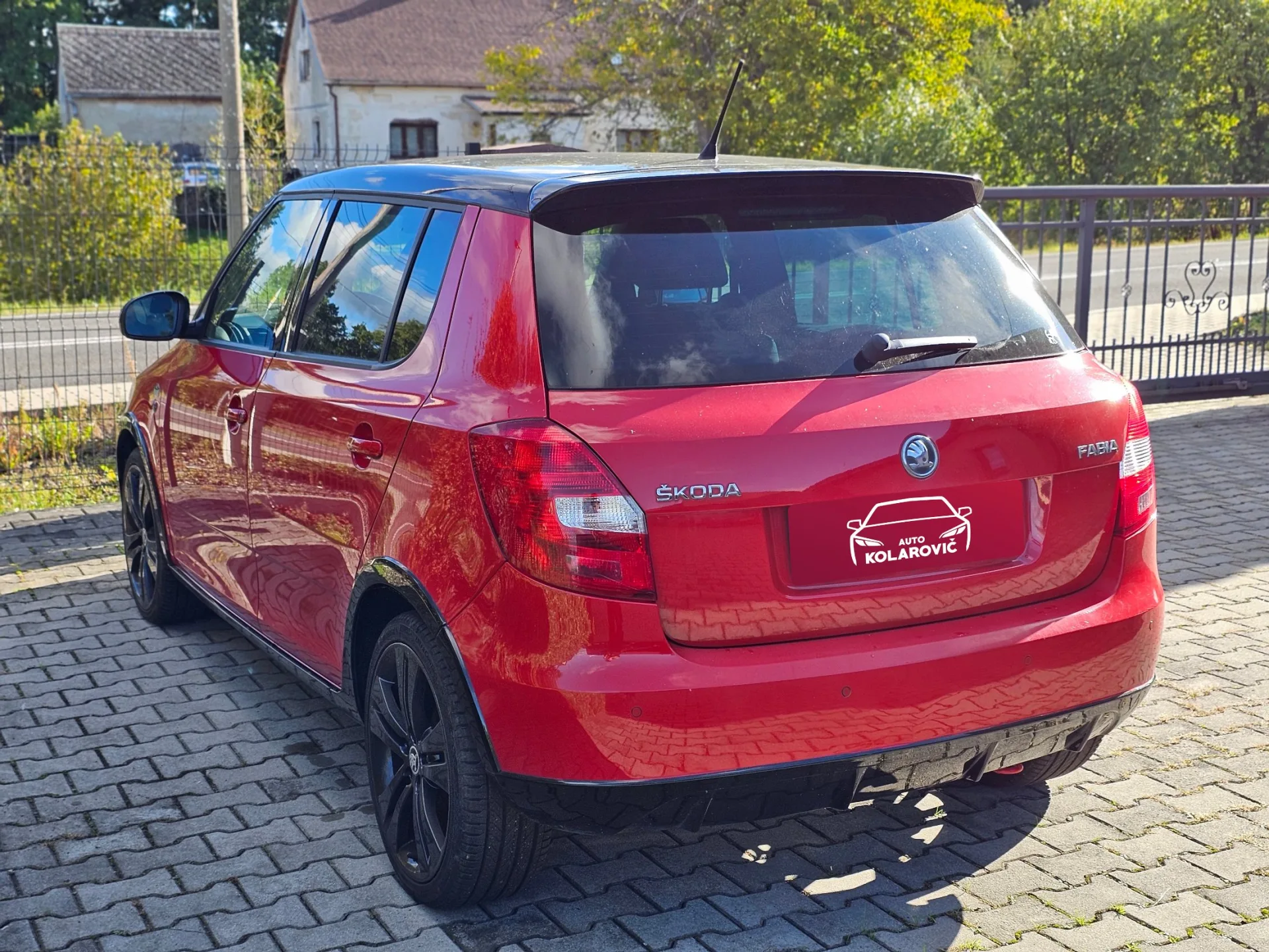 Škoda Fabia II 1.2 TSi Monte Carlo (2014, Červená) – fotografie vozidla 7 z 20