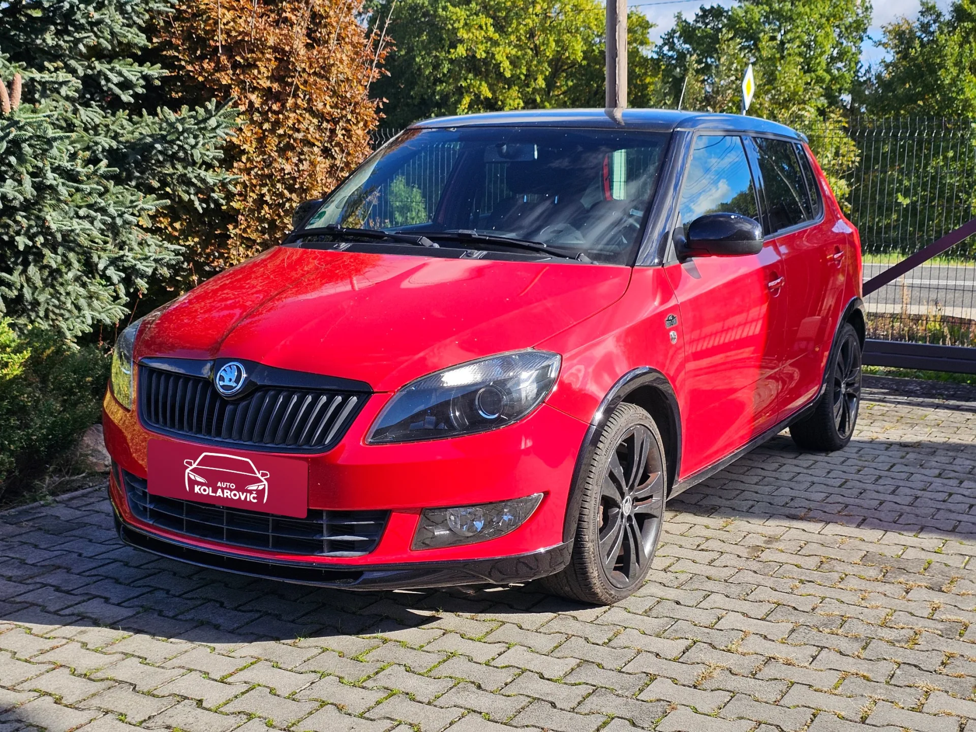 Škoda Fabia II 1.2 TSi Monte Carlo (2014, Červená) – hlavní fotografie vozidla