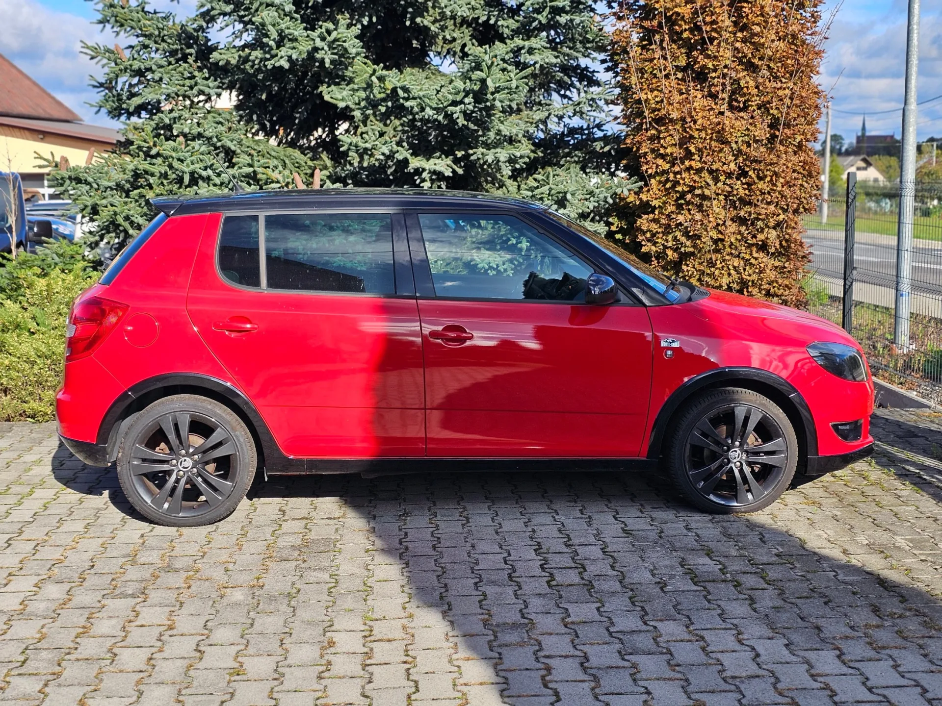 Škoda Fabia II 1.2 TSi Monte Carlo (2014, Červená) – fotografie vozidla 4 z 20