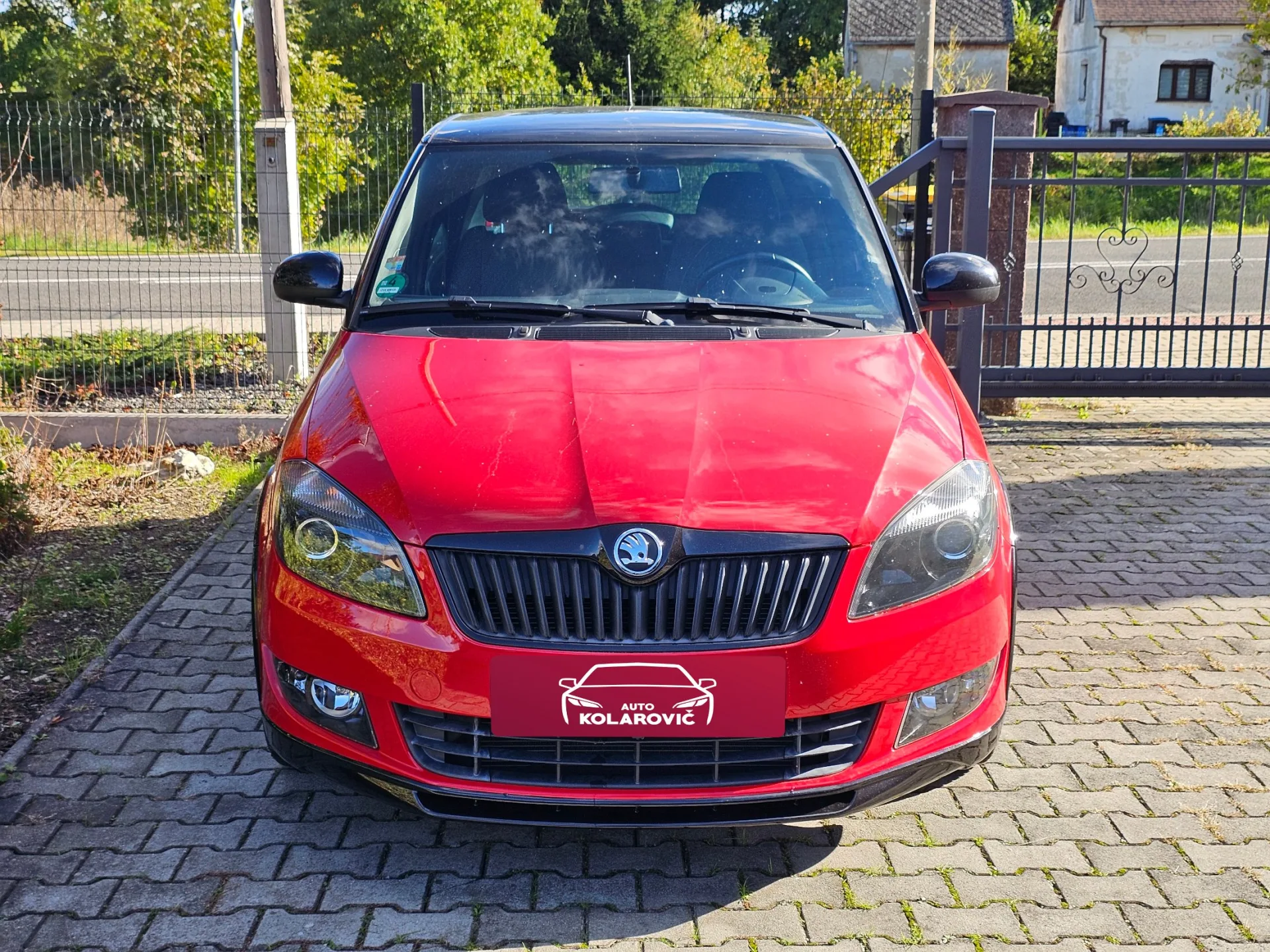 Škoda Fabia II 1.2 TSi Monte Carlo (2014, Červená) – fotografie vozidla 2 z 20