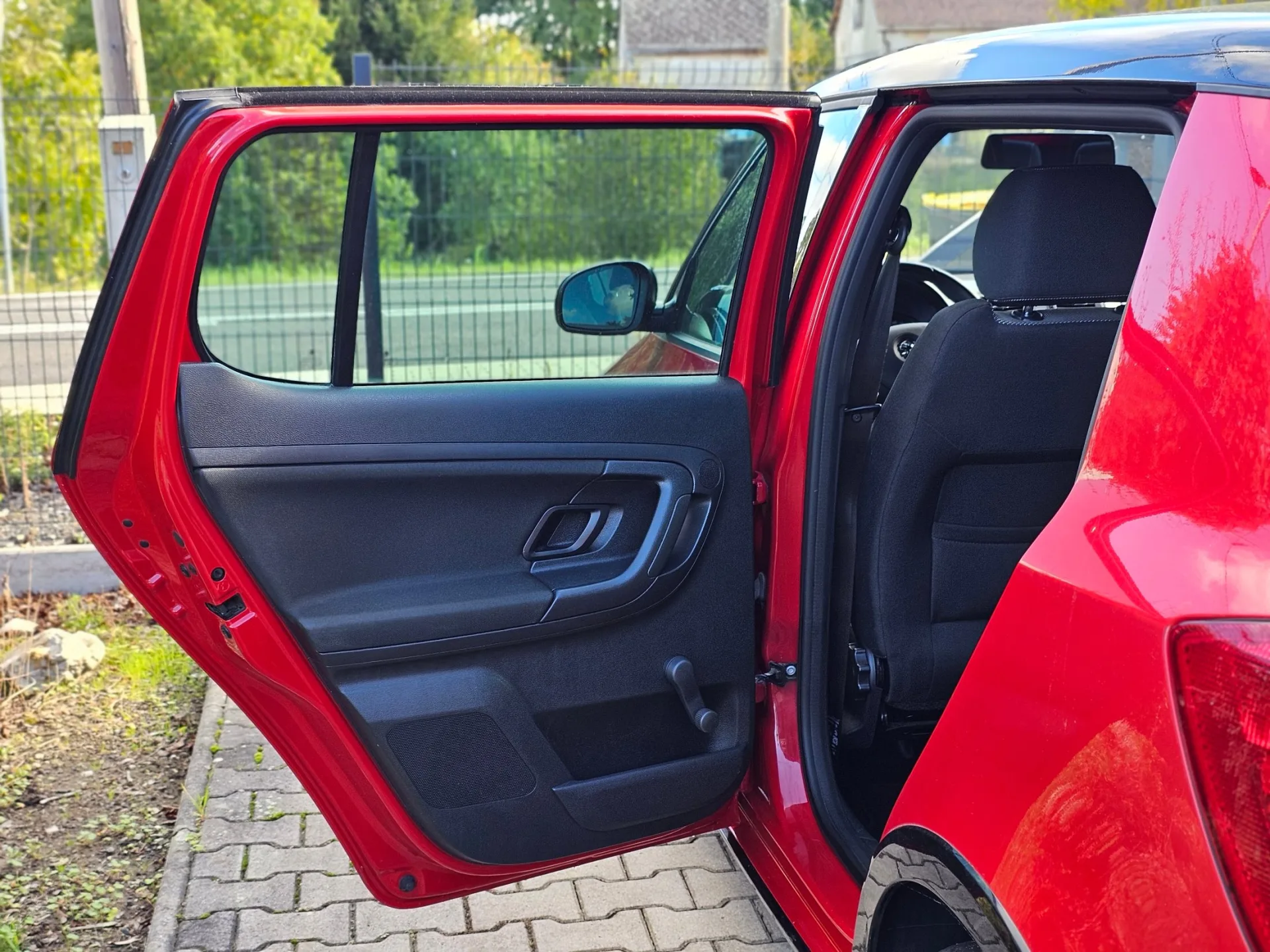 Škoda Fabia II 1.2 TSi Monte Carlo (2014, Červená) – fotografie vozidla 15 z 20