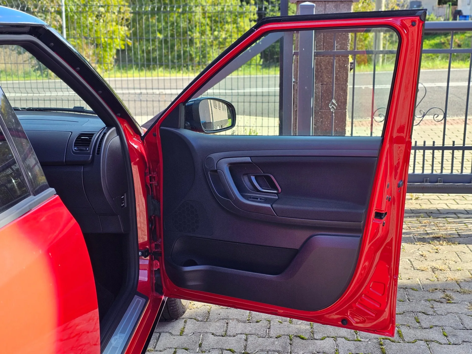 Škoda Fabia II 1.2 TSi Monte Carlo (2014, Červená) – fotografie vozidla 14 z 20