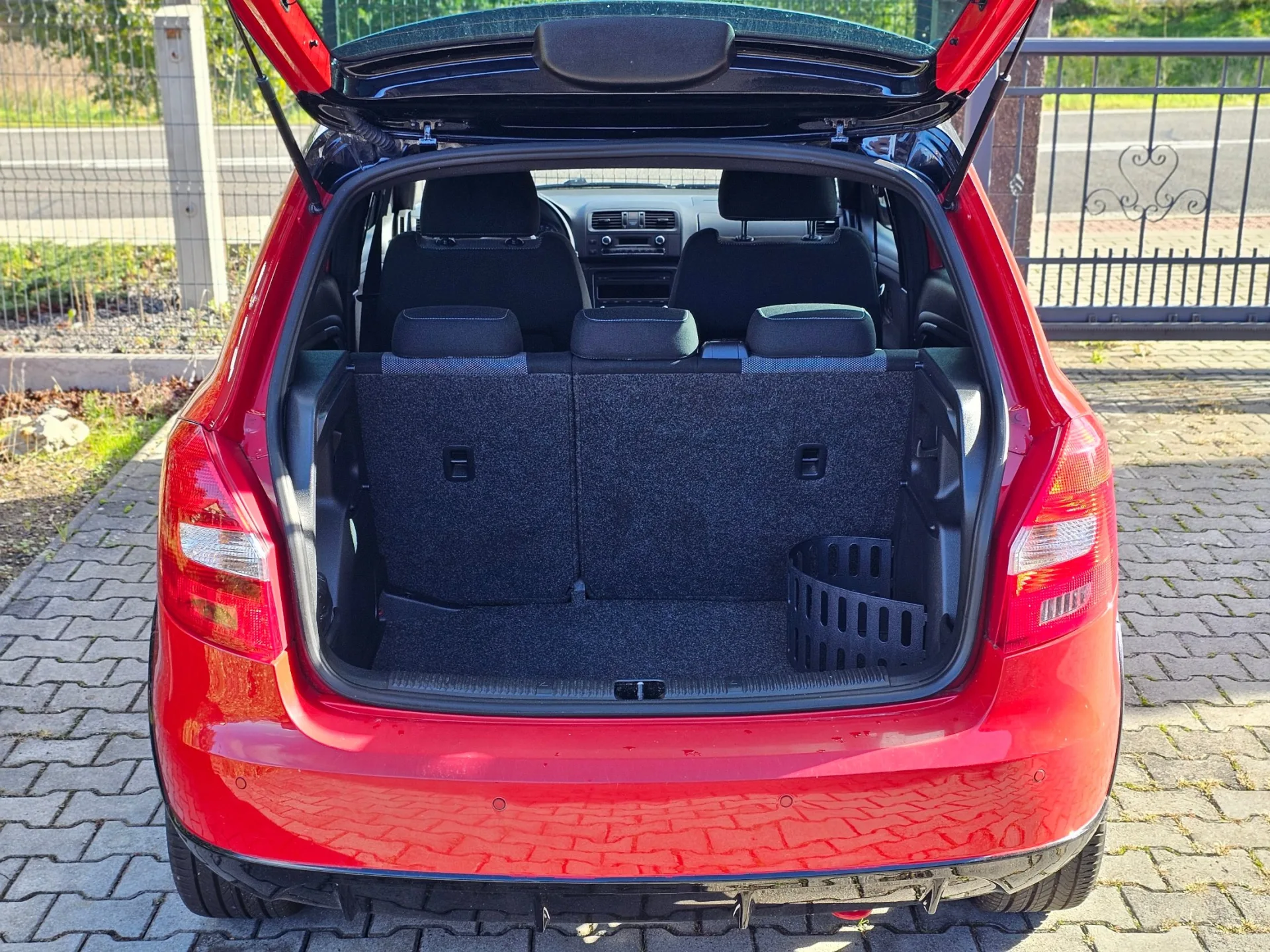 Škoda Fabia II 1.2 TSi Monte Carlo (2014, Červená) – fotografie vozidla 20 z 20