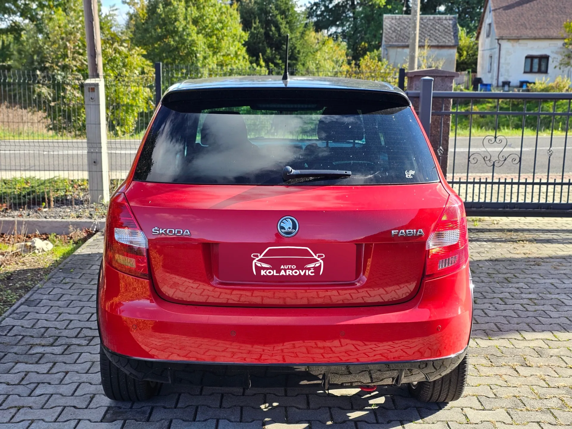 Škoda Fabia II 1.2 TSi Monte Carlo (2014, Červená) – fotografie vozidla 6 z 20