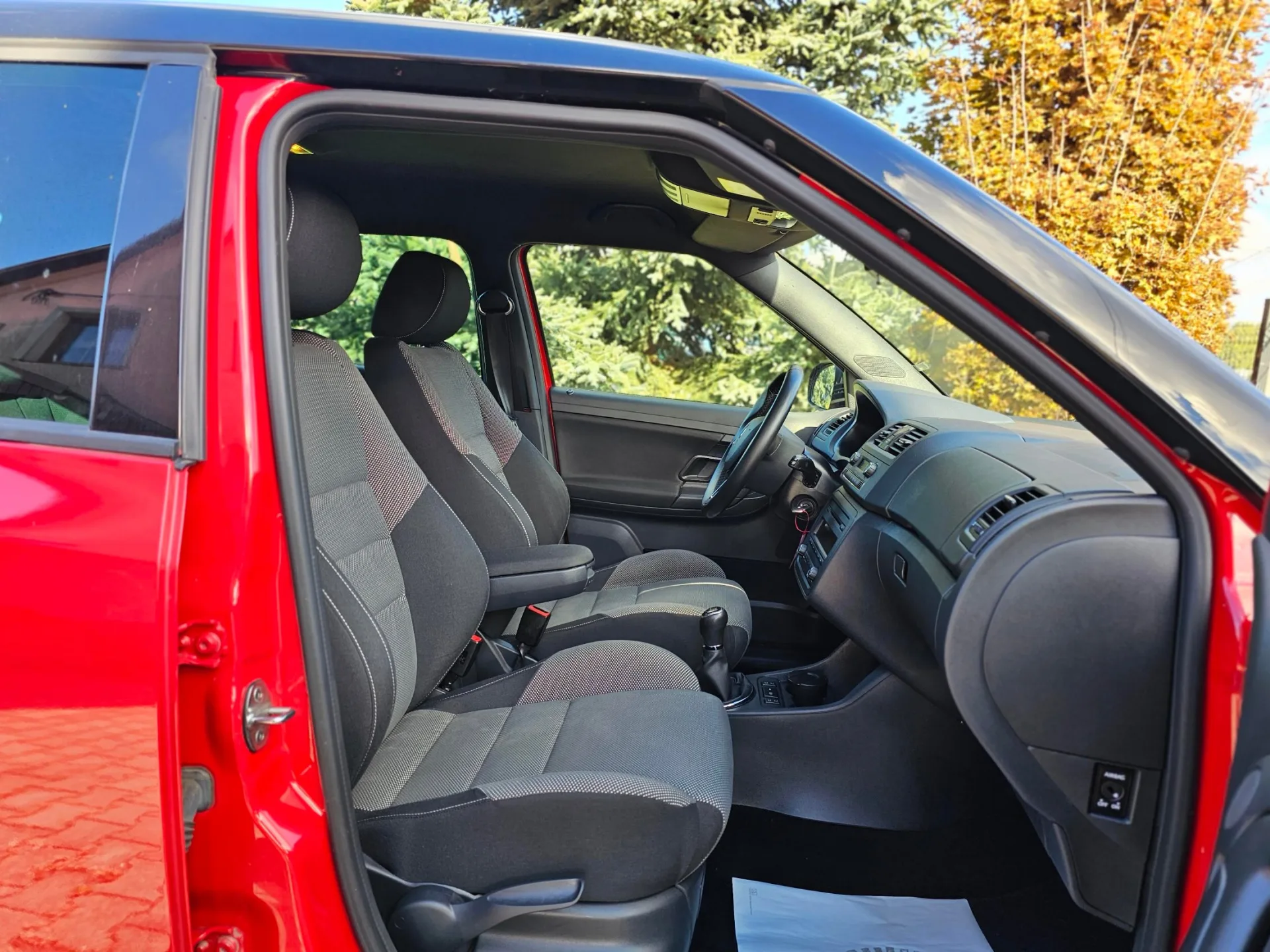 Škoda Fabia II 1.2 TSi Monte Carlo (2014, Červená) – fotografie vozidla 13 z 20