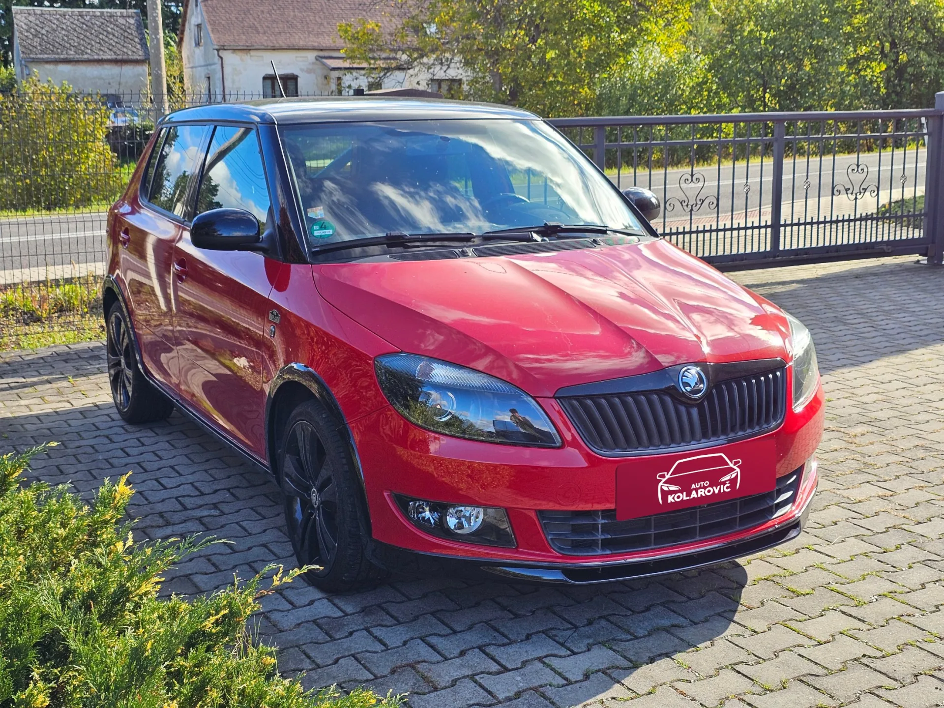 Škoda Fabia II 1.2 TSi Monte Carlo (2014, Červená) – fotografie vozidla 3 z 20